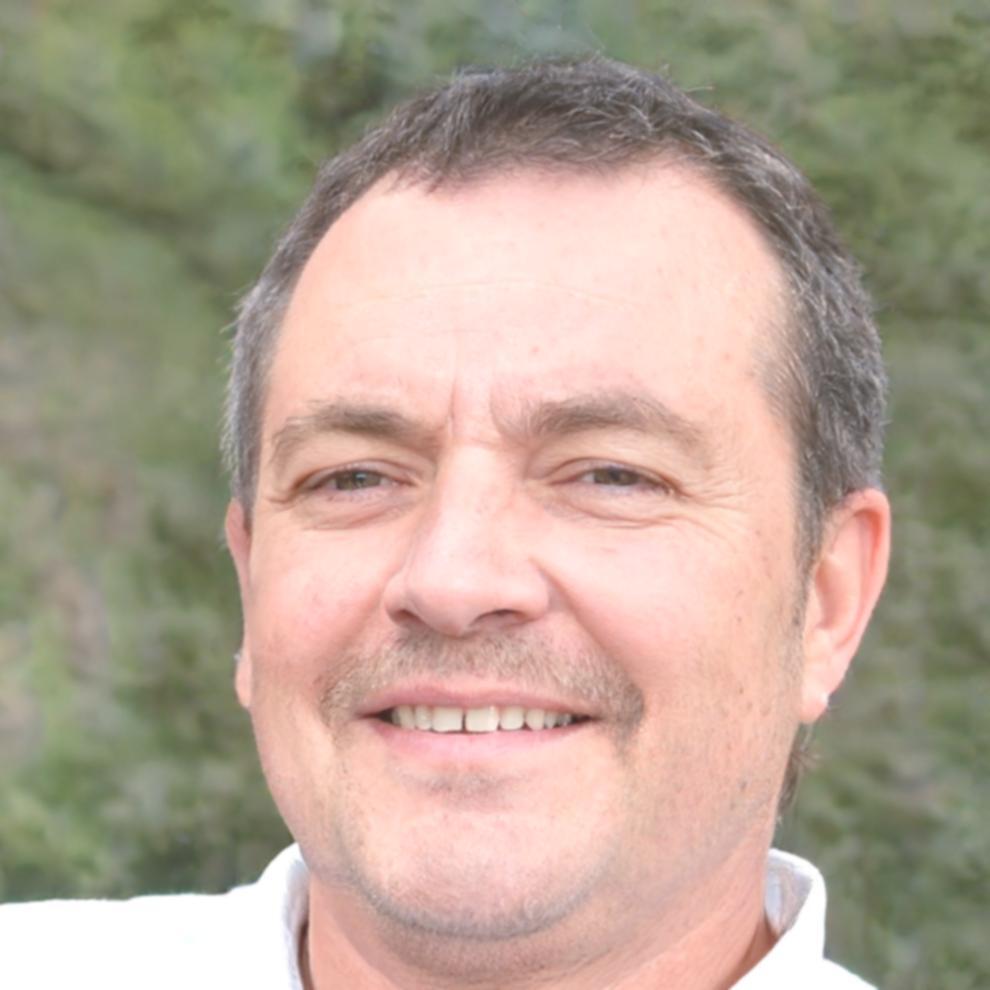 Liam Thornburg legt JavaScript concepts uit aan studenten